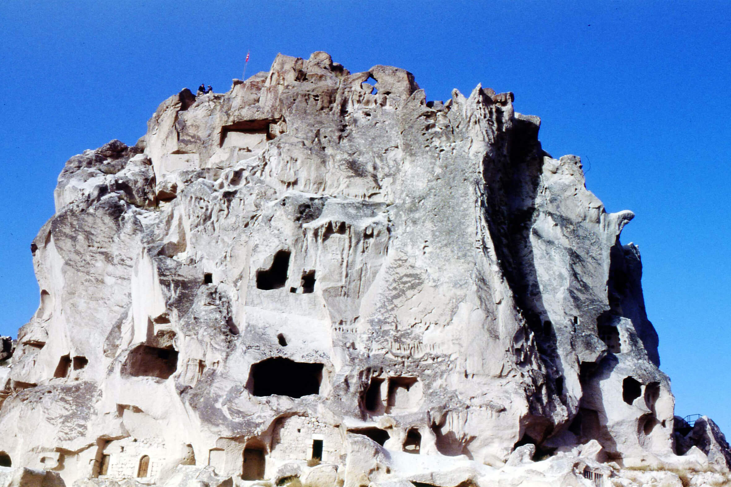 Picture of Uçhisar Castle in Cappadocia, which is a castle carved into a huge rock cone.